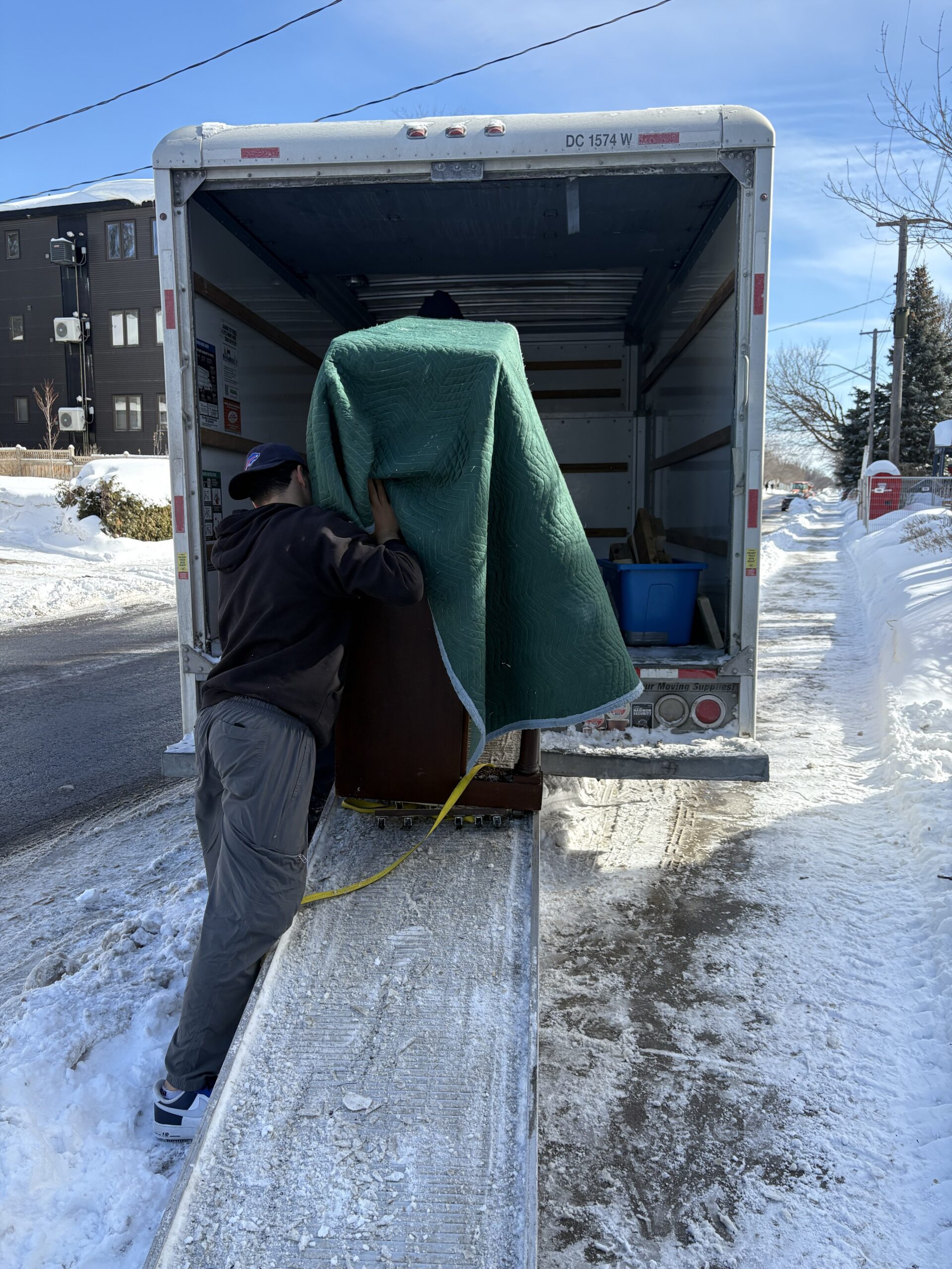 Helping move furniture as part of clearing a property.